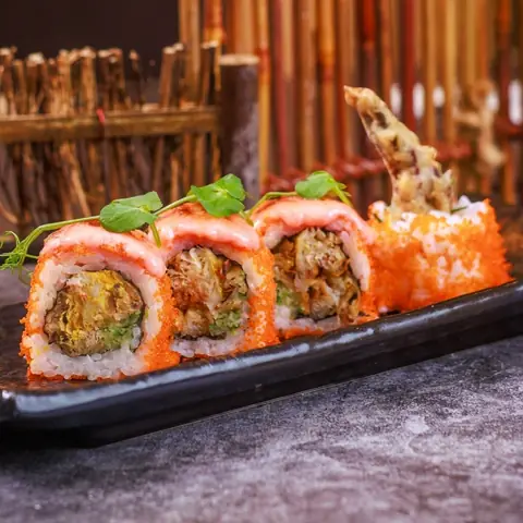 Spider Mentai Maki — Fried soft shell crab topped with shrimp roe, torched with cod roe mayonnaise