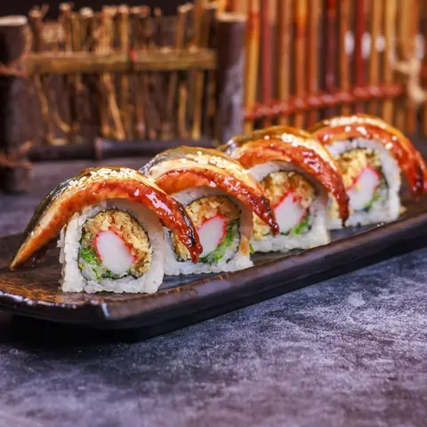 Unagi Maki — Roasted eel, crabstick and cucumber