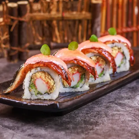 Unagi Mentai Maki — Roasted eel, crabstick and cucumber with torched cod roe mayonnaise