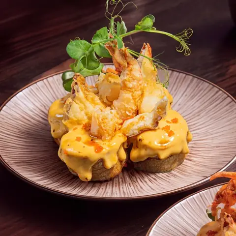 Volcano Ebiten Maki — Crispy prawn and eggplant fritter, torched with house cheese sauce