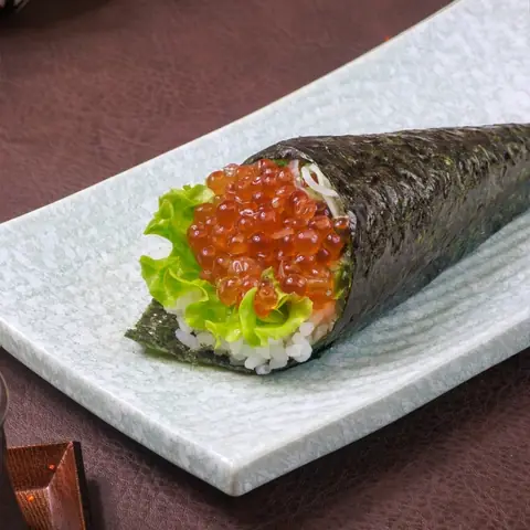 Ikura Temaki — Hand roll with seasoned salmon roe