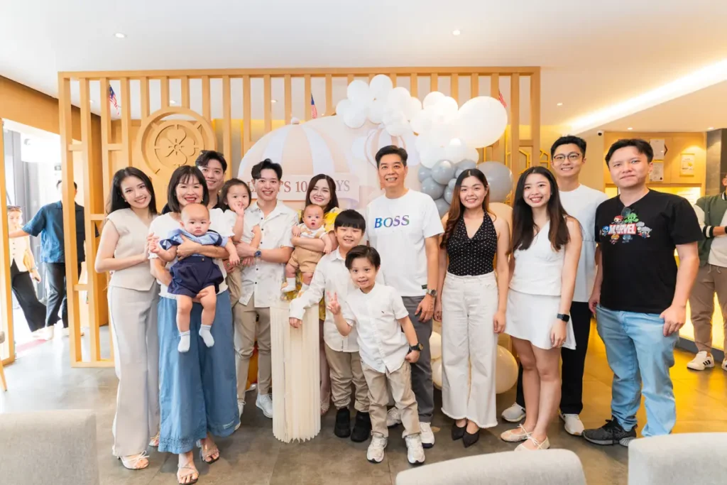 Family and friends gathered for a group photo at the celebration