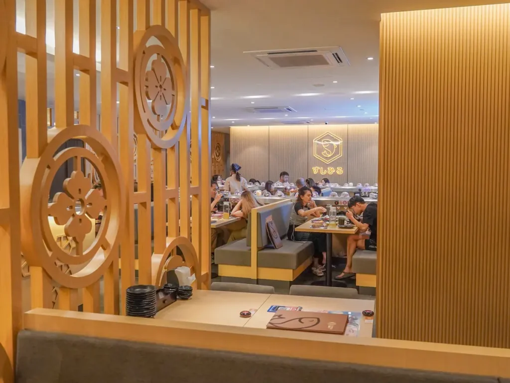 Families dining inside a Sushi Hiro outlet